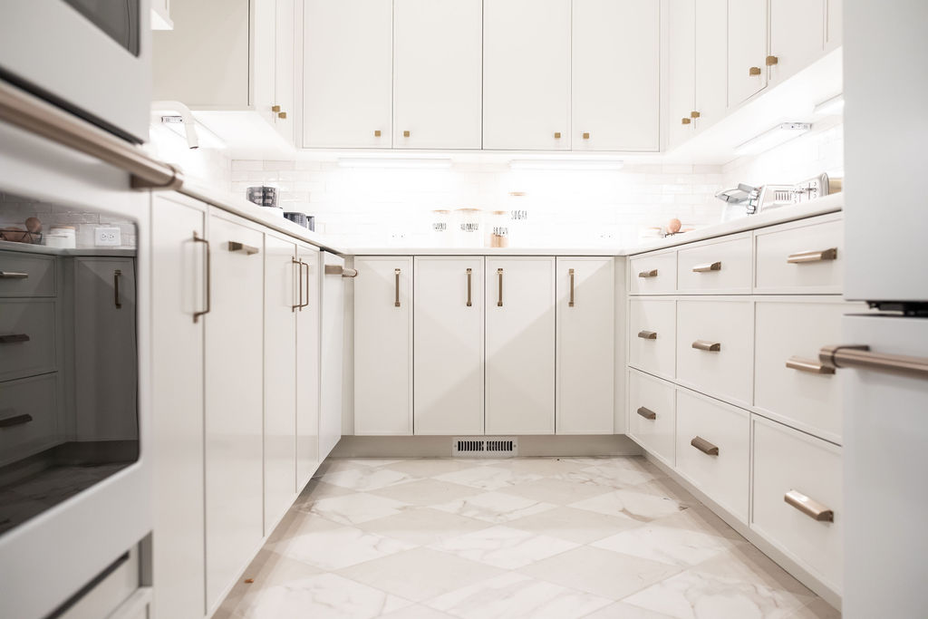 Butler's pantry, custom cabinetry, brass hardware, marble floors